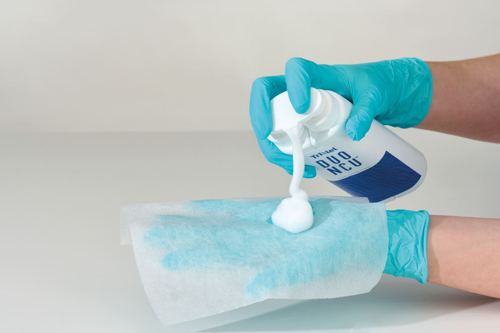 Tristel DUO NCU being applied on Tristel DUO WIPES - Ultrasound and skin surface transducer cleaner disinfection